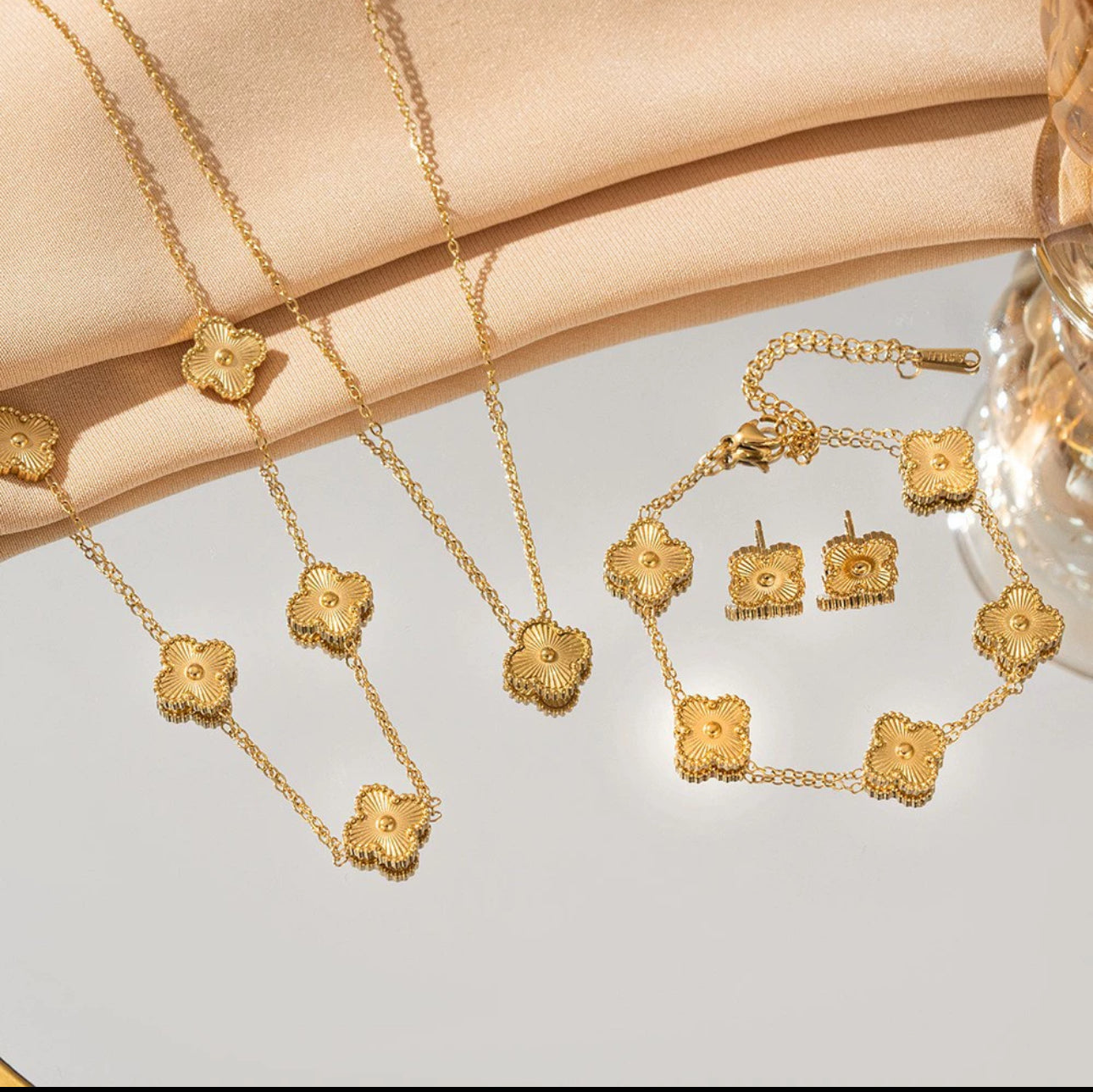 Pack trèfles (bracelet+boucles d'oreilles+collier) OR